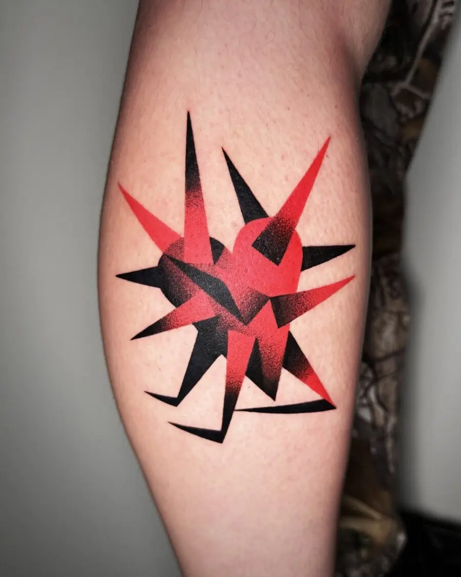 Edgy candy heart tattoo with spikes