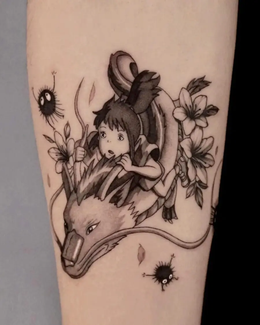 Dynamic depiction of Chihiro and Haku in tattoo