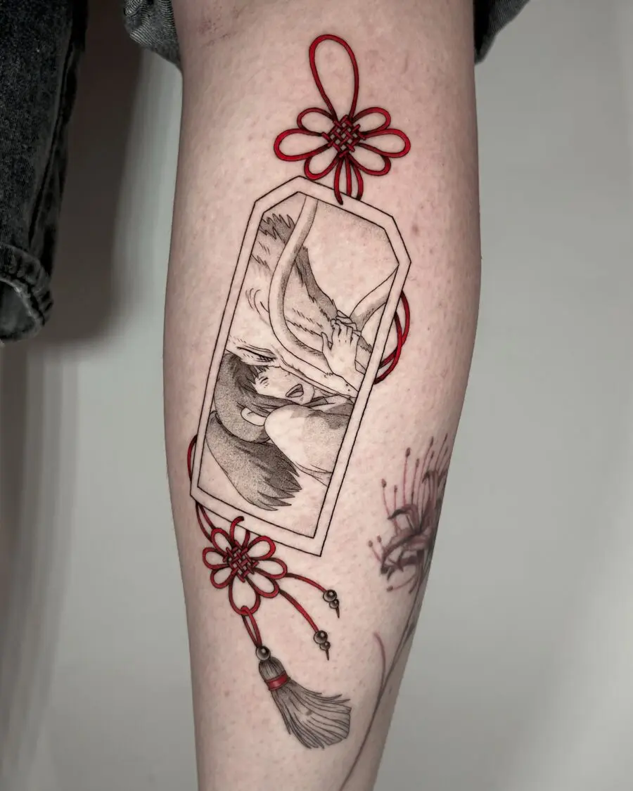 Intricate Spirited Away Tattoo with Floral Accents