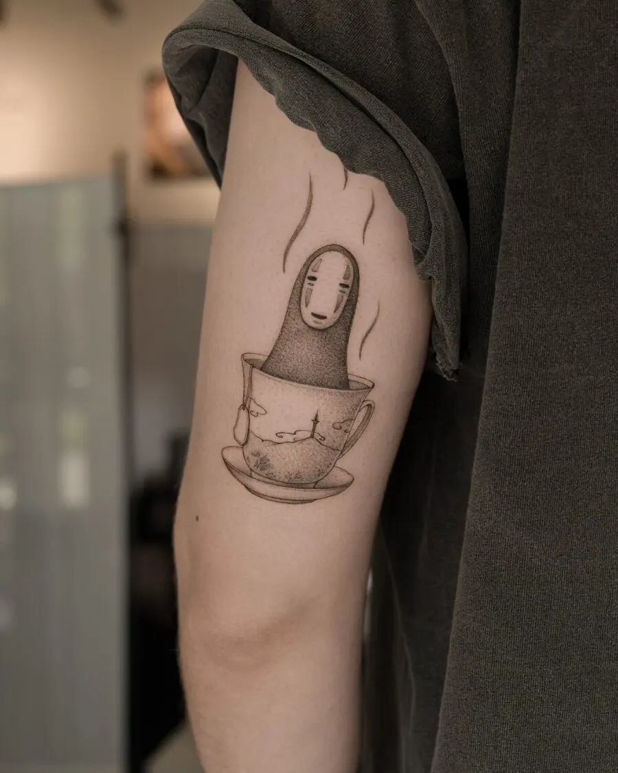 Elegant No-Face Tattoo with Tea Cup Design