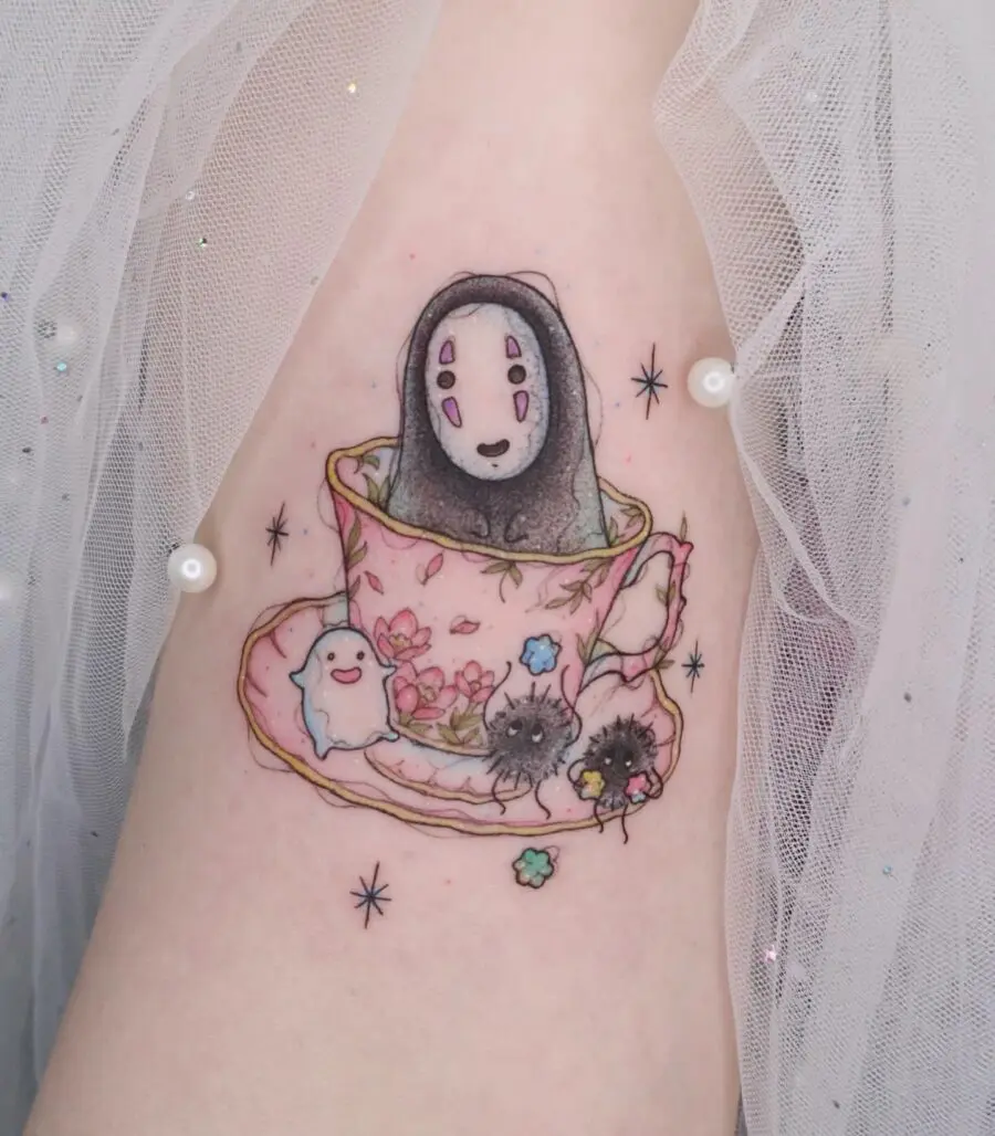 Whimsical No-Face Tea Cup Tattoo Delight