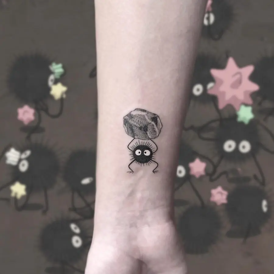 Adorable rock spirit tattoo in minimalist style