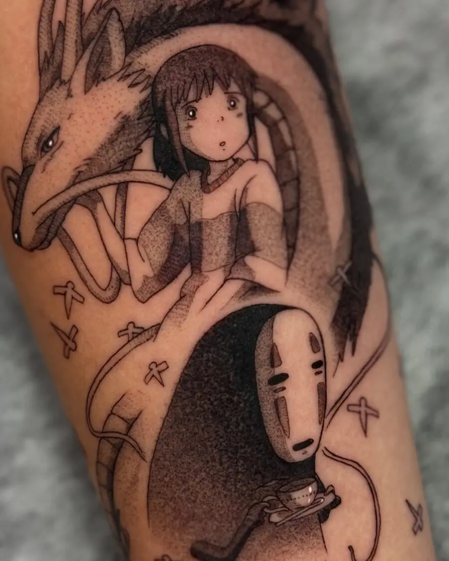 Intricate Spirited Away tattoo featuring key characters