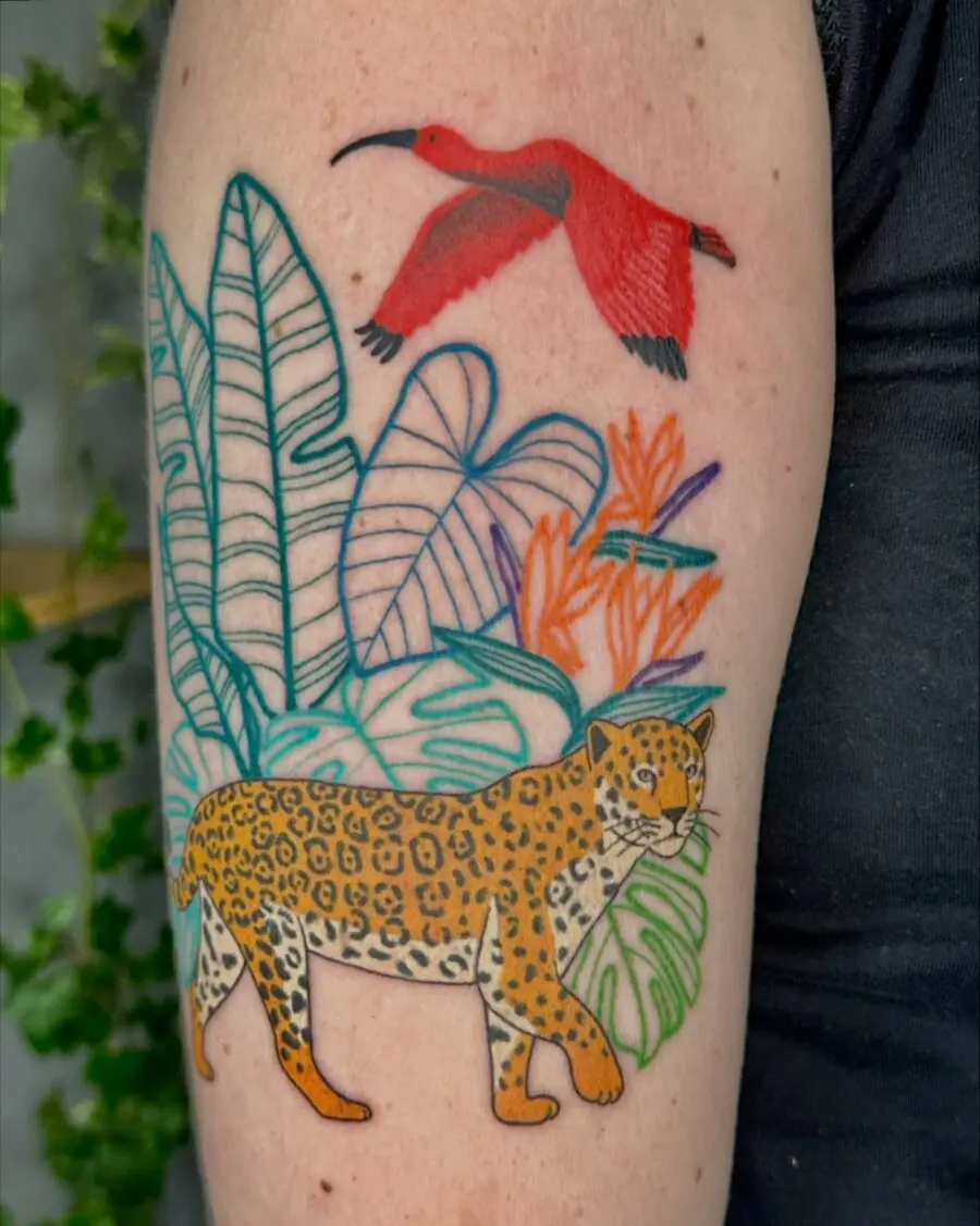 Colorful leopard and bird tattoo design