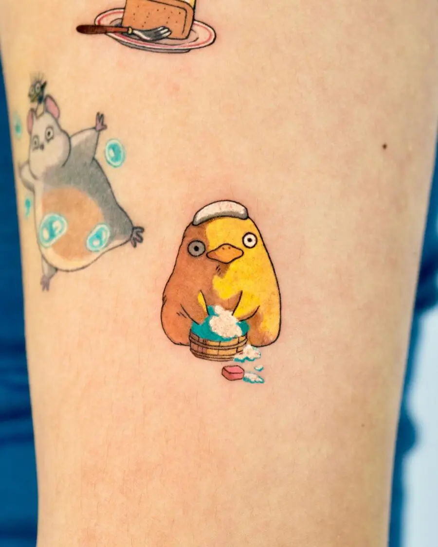 Charming penguin tattoo inspired by Spirited Away