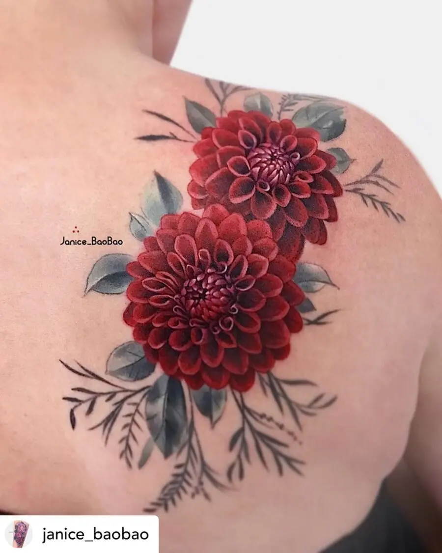 Vibrant red dahlia tattoo showcasing floral beauty