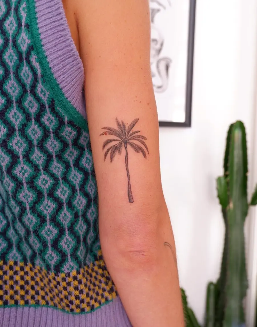 Stylish palm tree tattoo on forearm