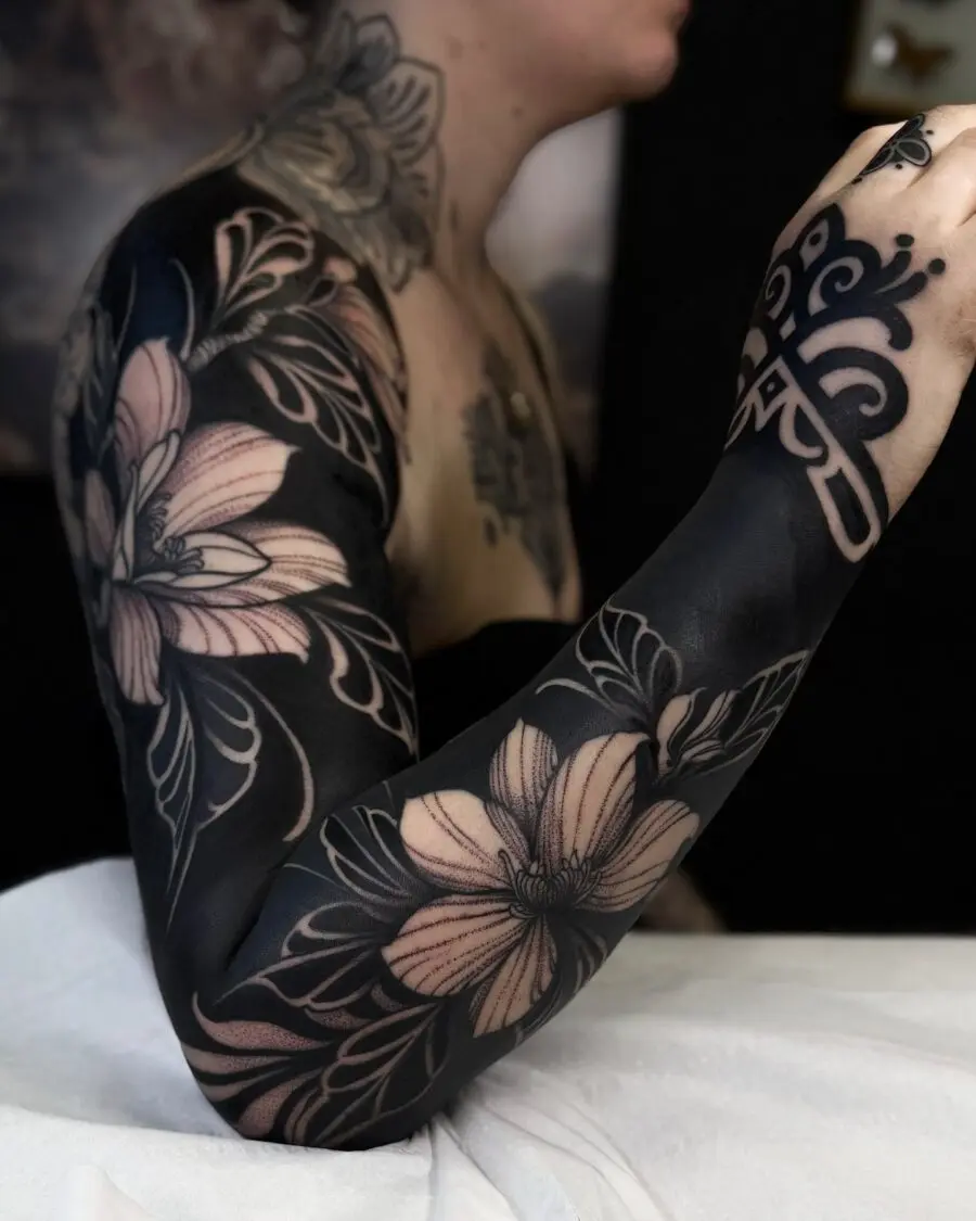 Stunning black floral sleeve tattoo detail
