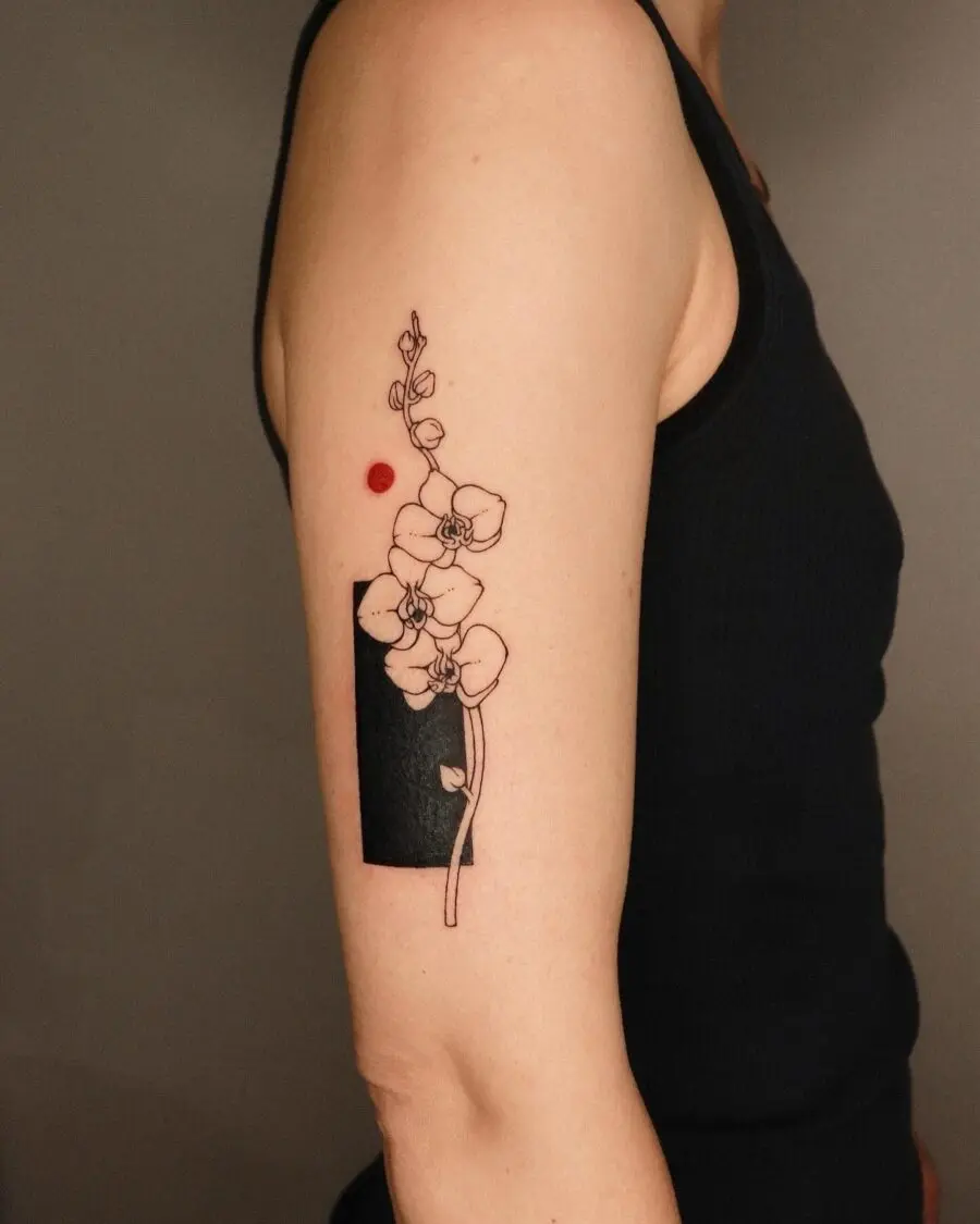 Elegant Floral Tattoo with Bold Geometry