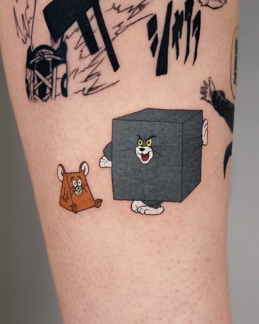 Playful Tom and Jerry cartoon character tattoos