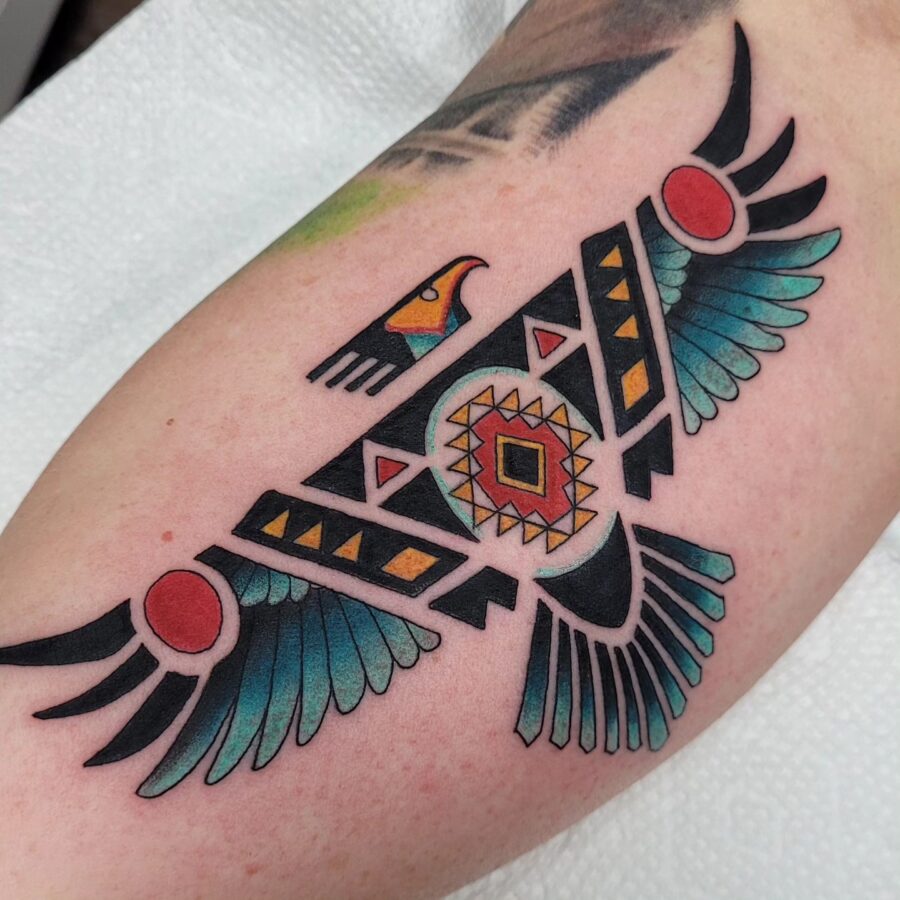 Colorful turkey tattoo with detailed tribal style