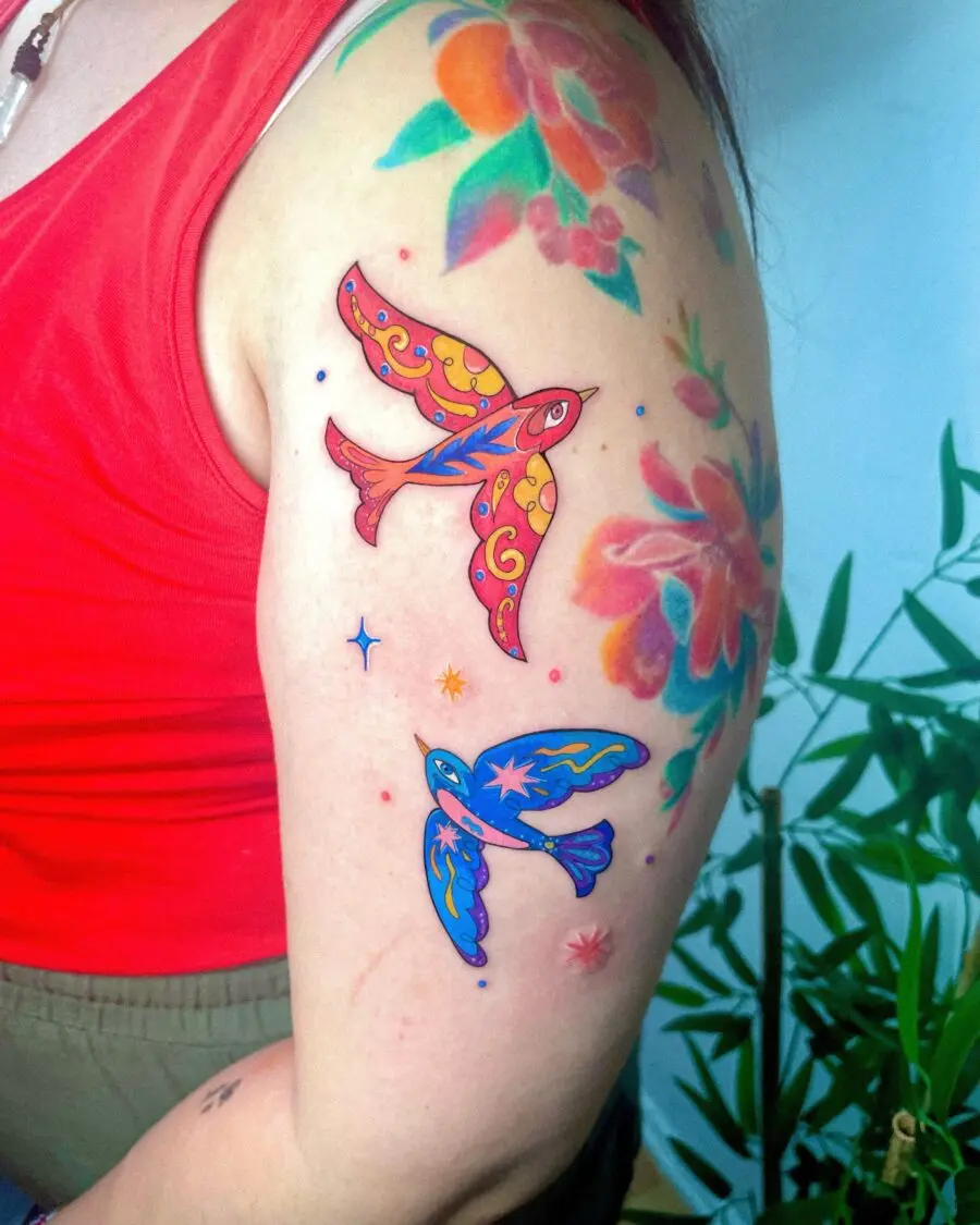 Colorful turkey tattoos on a lively arm