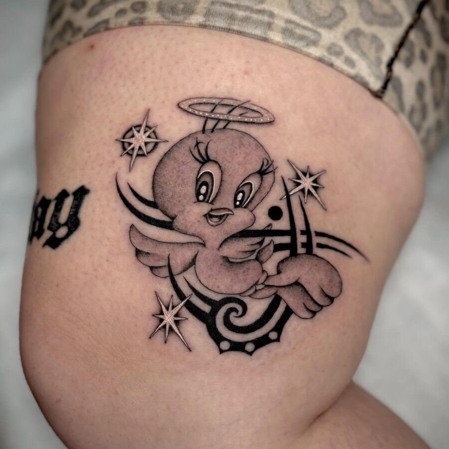 A playful angelic Tweety Bird tattoo design