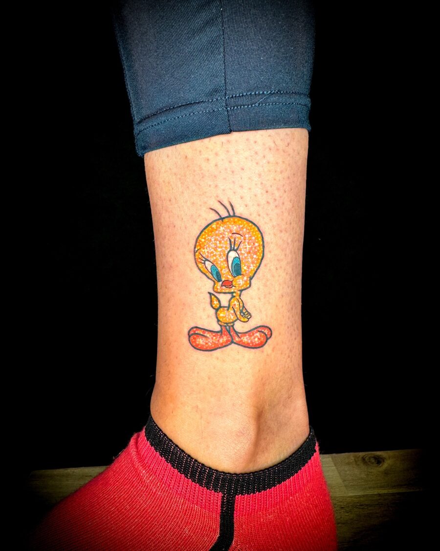 Vibrant Tweety Bird Tattoo on Ankle