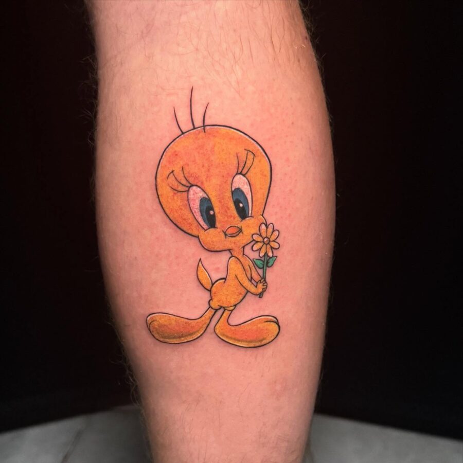 Charming Tweety Tattoo Holding a Flower