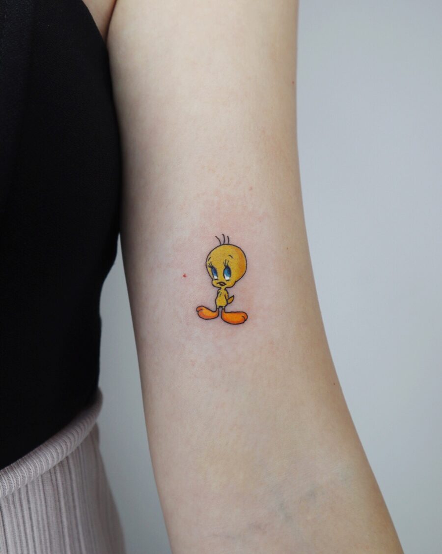 Vibrant Tweety Tattoo on the Arm