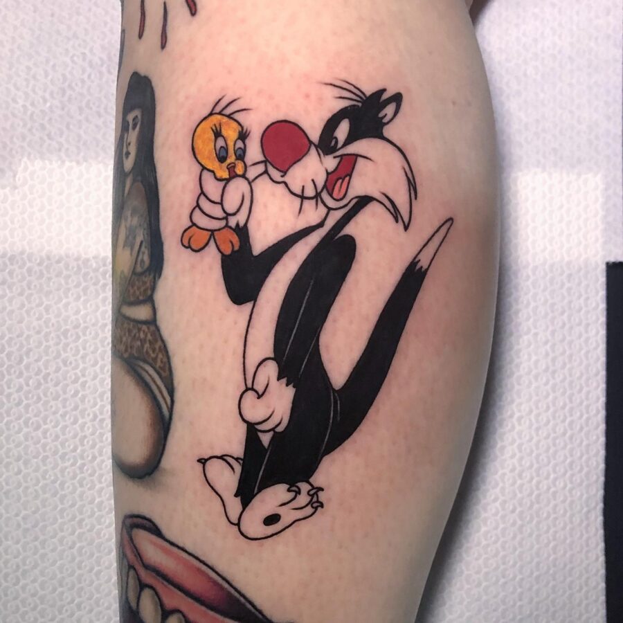 Playful Sylvester and Tweety Tattoo Design