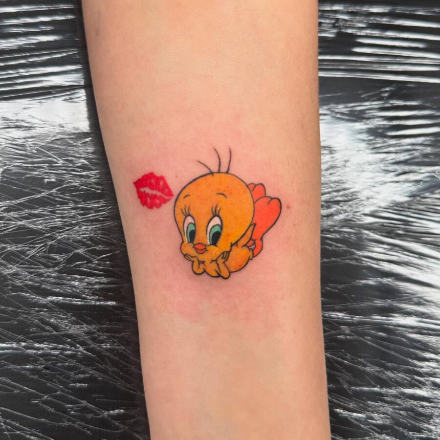 Adorable Tweety Tattoo with Lip Prints