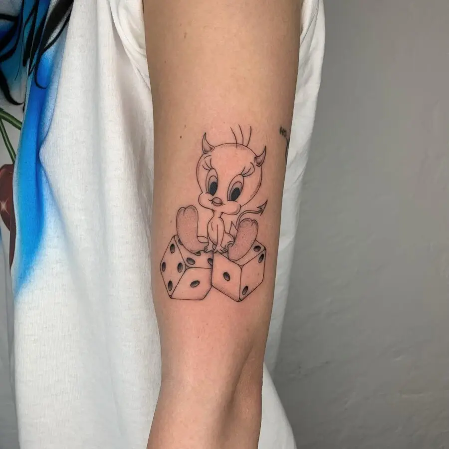 Playful Tweety Bird with Dice Tattoo