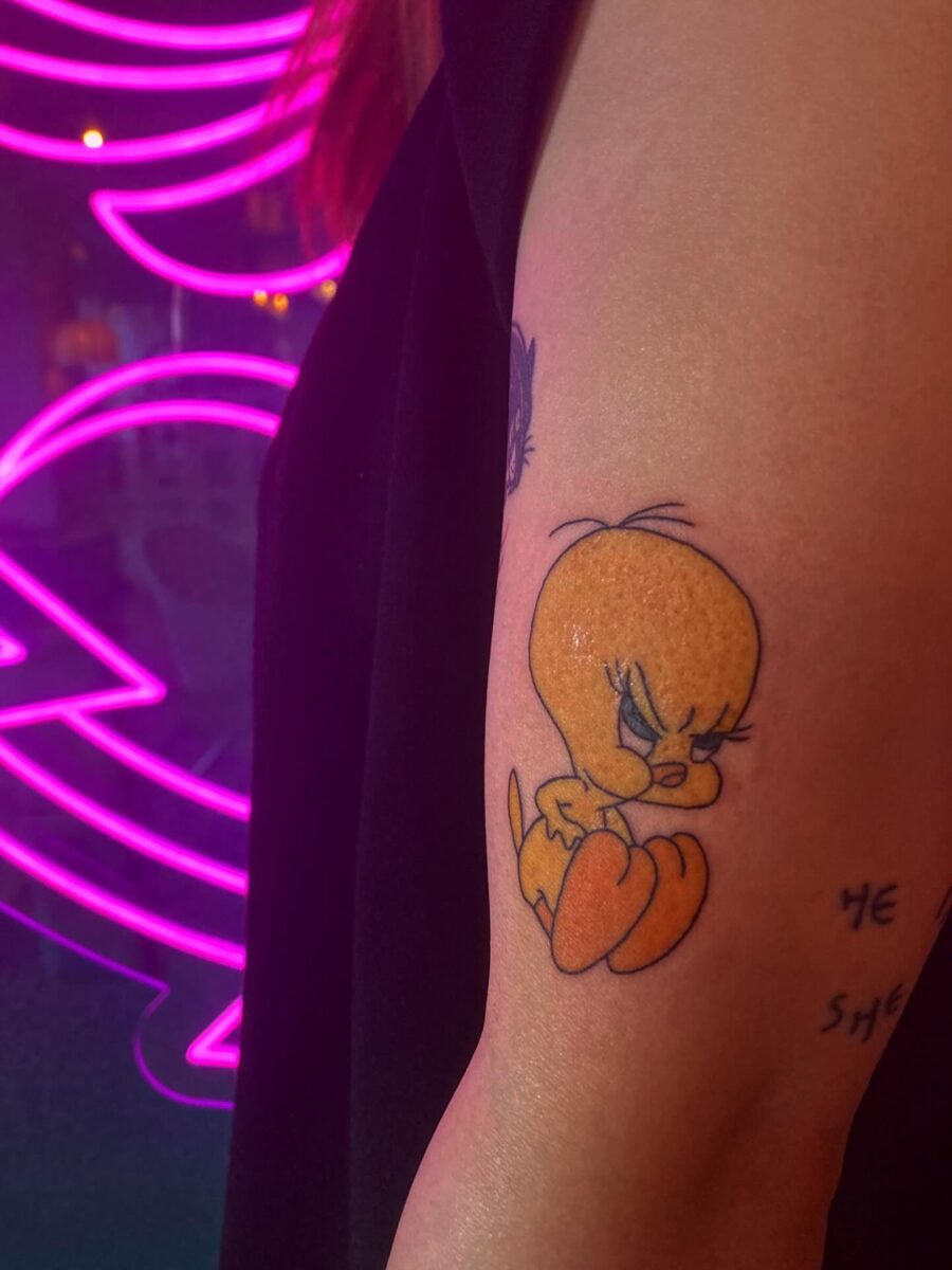 Whimsical Tweety Tattoo with Attitude