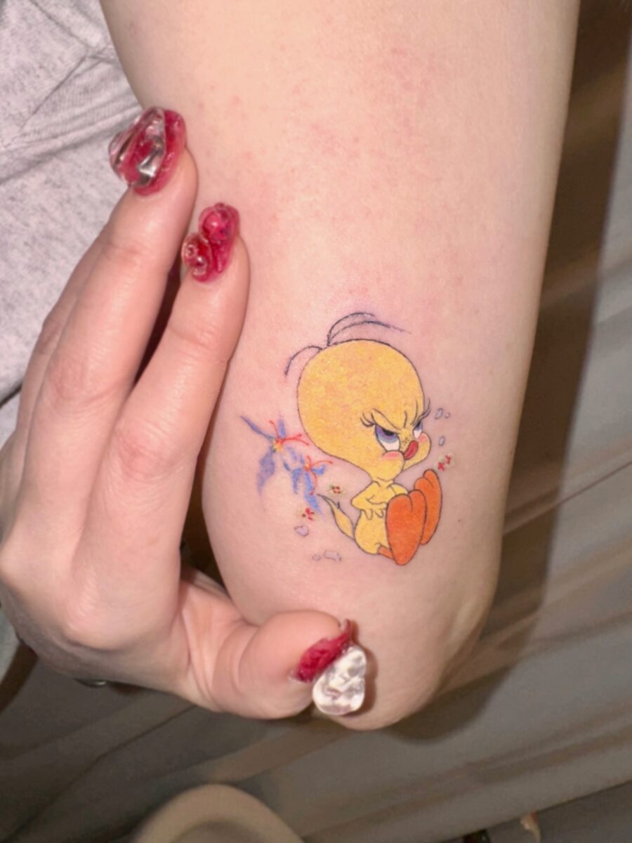 Whimsical Tweety Tattoo with Bold Colors