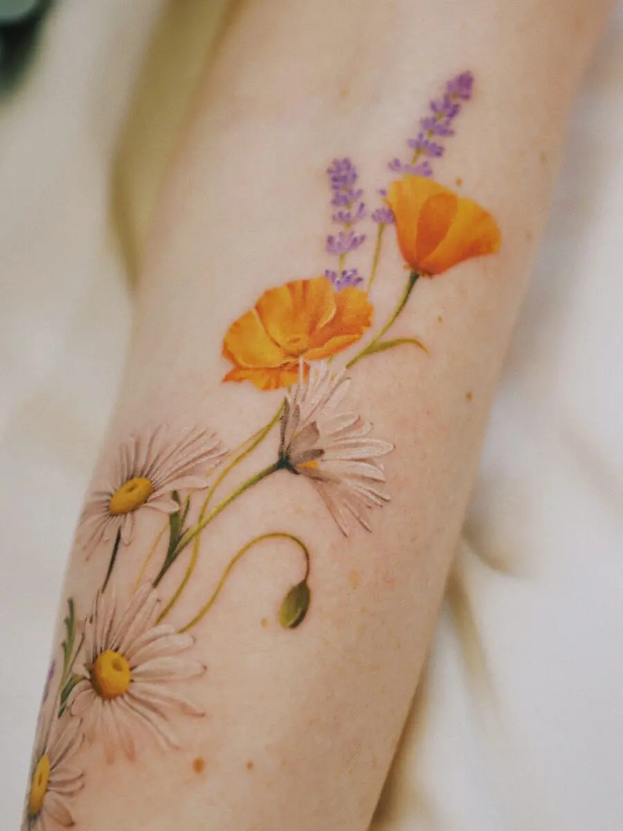 Beautiful buttercup flower tattoo design on arm