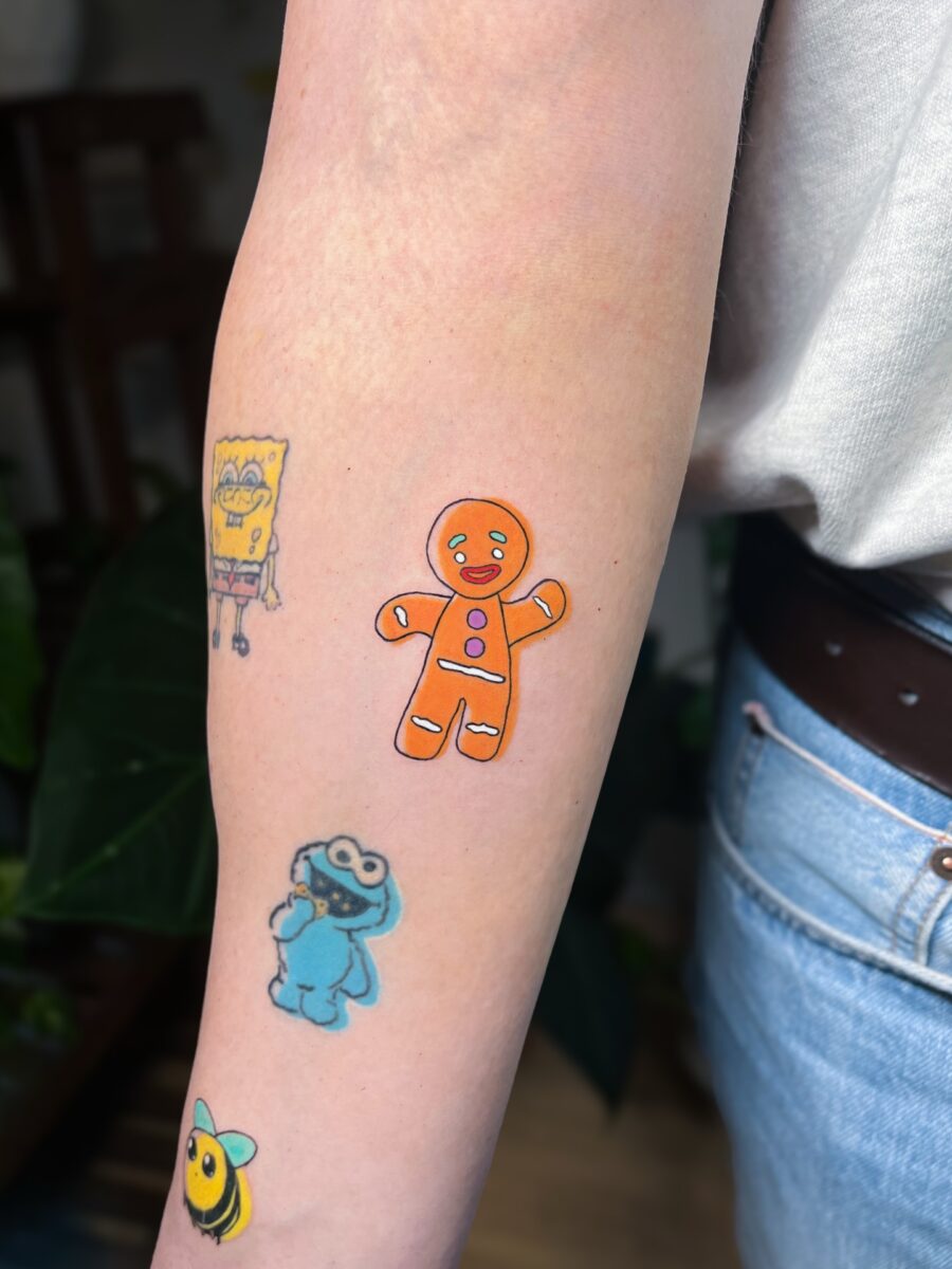 Whimsical cartoon tattoos for playful vibes