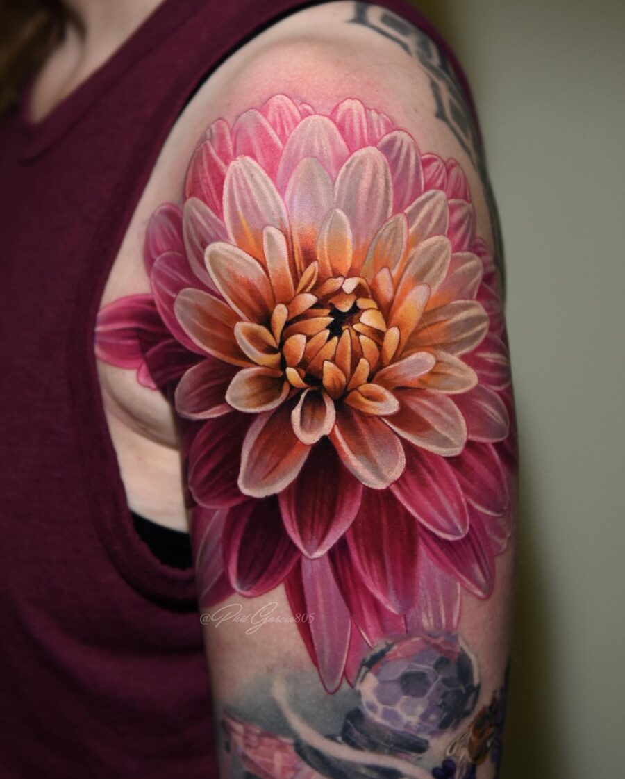 Stunning vibrant dahlia tattoo design