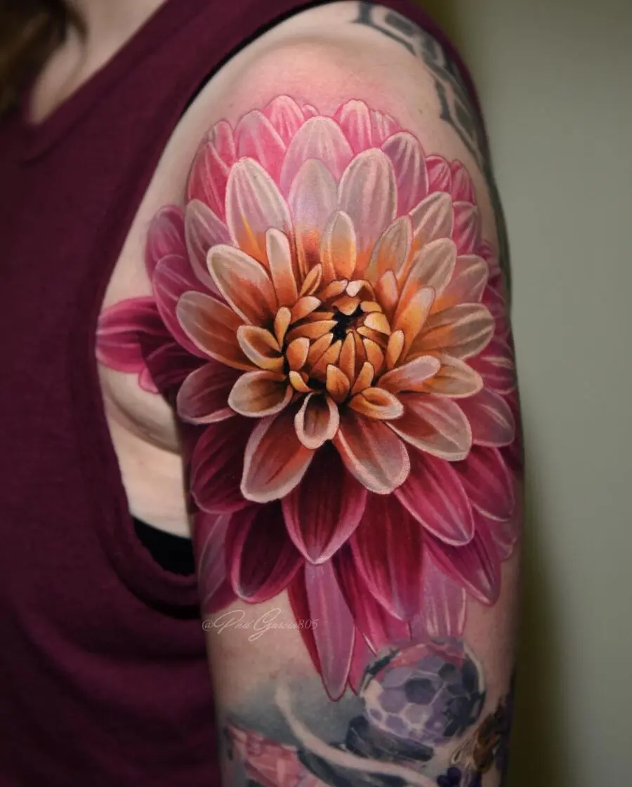 Stunning vibrant dahlia tattoo design