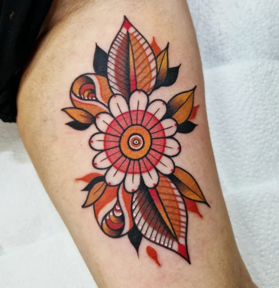 Bold floral design for biceps tattoos