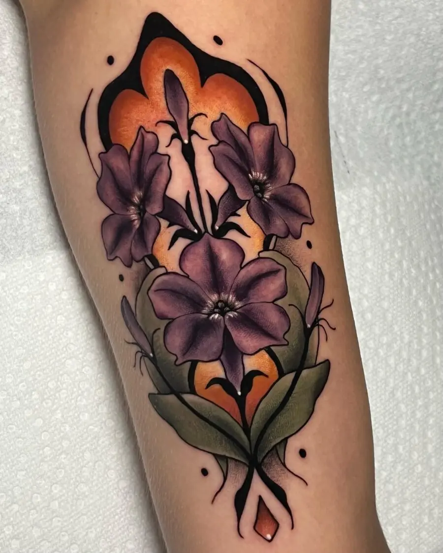 Stunning petunia tattoo design with bold colors