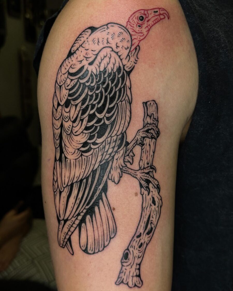 Intricate vulture tattoo celebrating nature and art