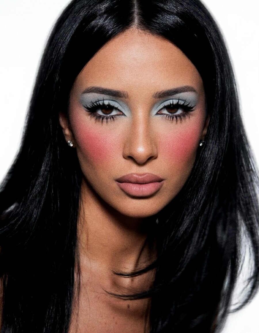 Dramatic blue and pink wedding guest look