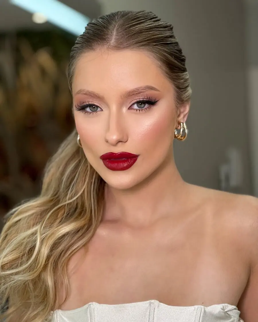 Glamorous red lip look for wedding guests