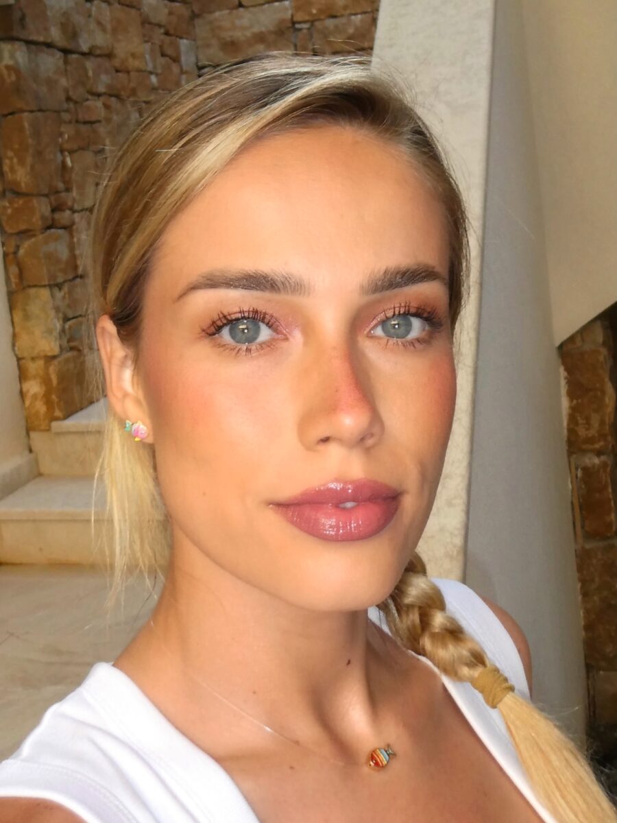 Fresh and radiant wedding guest makeup style