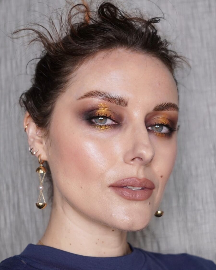 Glamorous gold smokey eye with nude lips