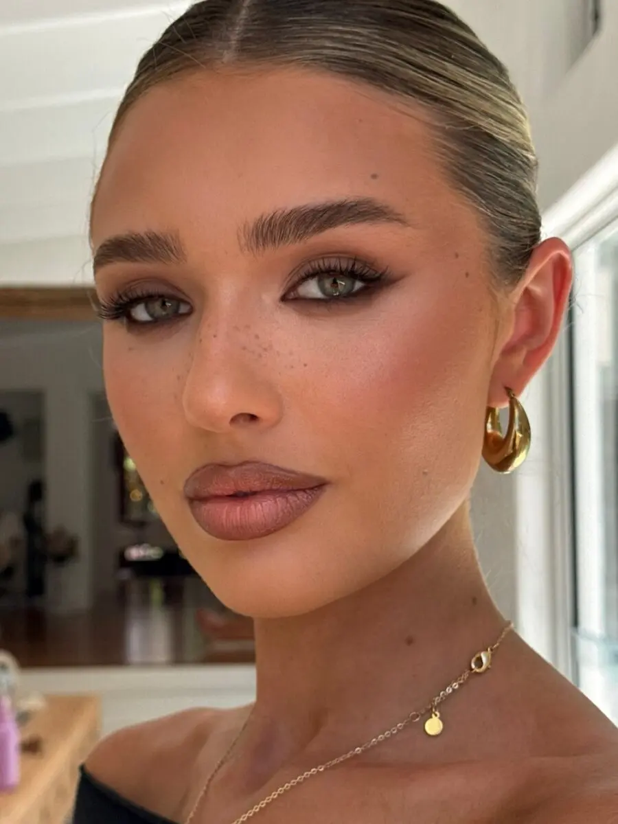 Sunkissed elegance for wedding guest makeup