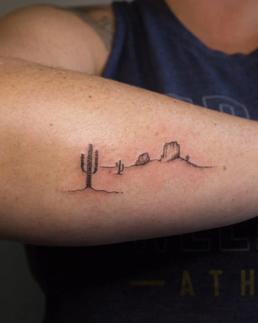 Minimalist cactus tattoo capturing western vibes