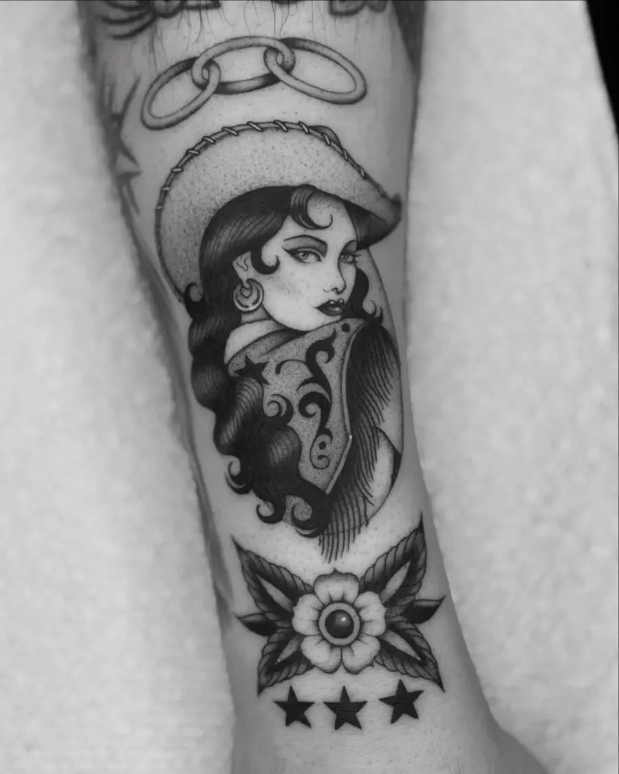 Classic Western Cowgirl Tattoo with Floral Design