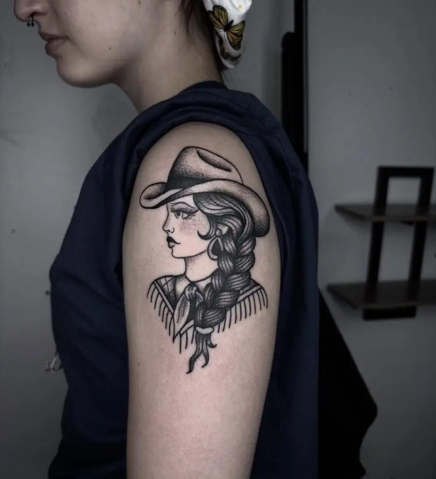 Stylish Cowgirl Tattoo on Upper Arm