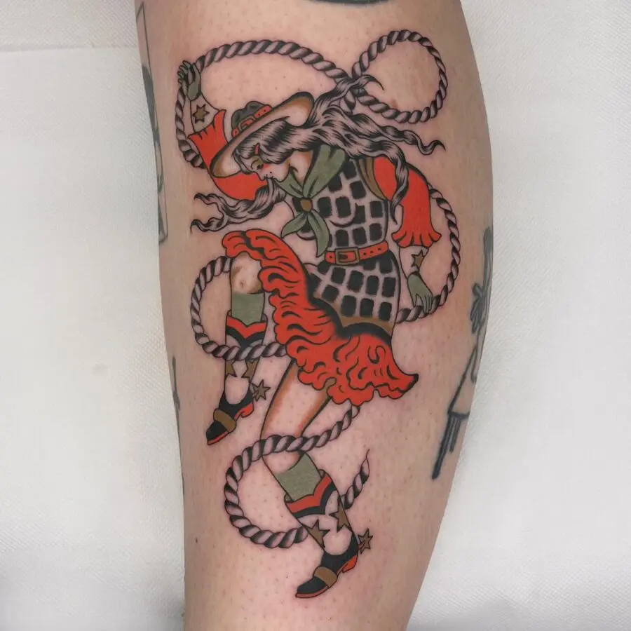 Dynamic Cowgirl With Stylish Rope Tattoo