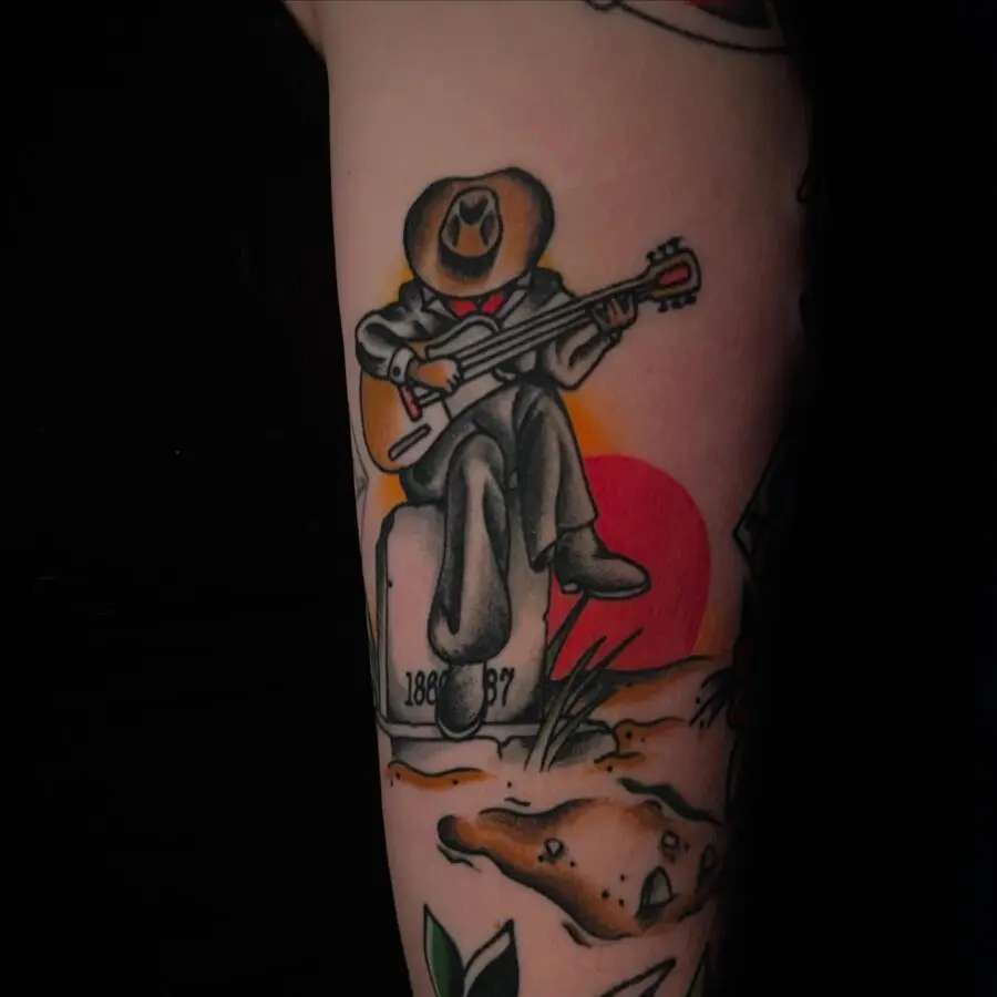 Cowboy Playing Guitar: A Classic Western Tattoo