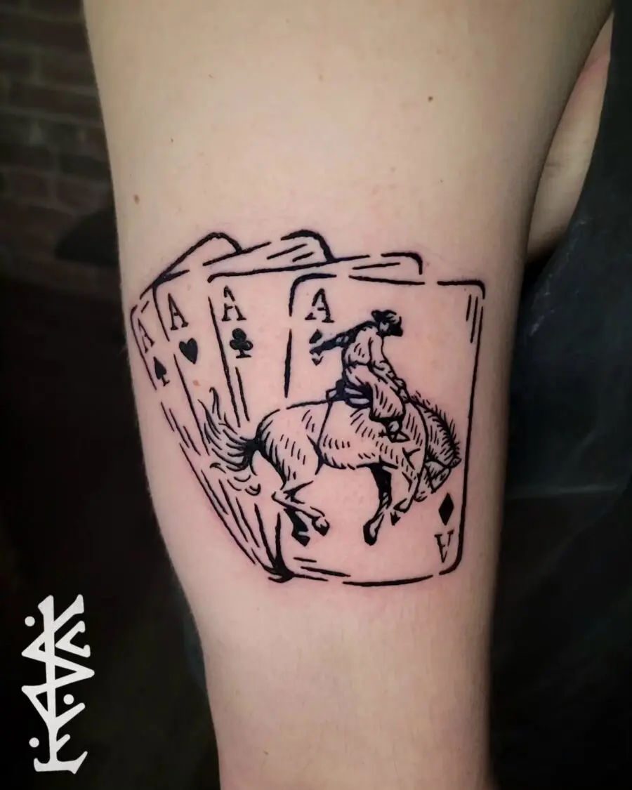 Stylish Western tattoo featuring a horse rider