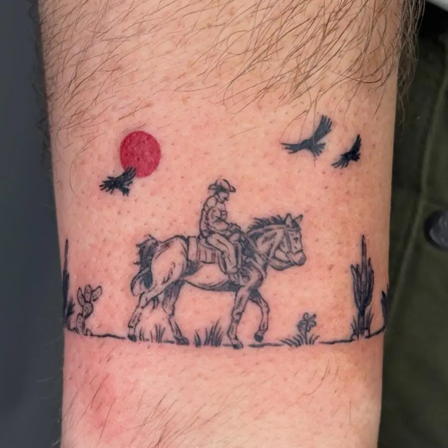 Captivating cowboy on horseback tattoo design