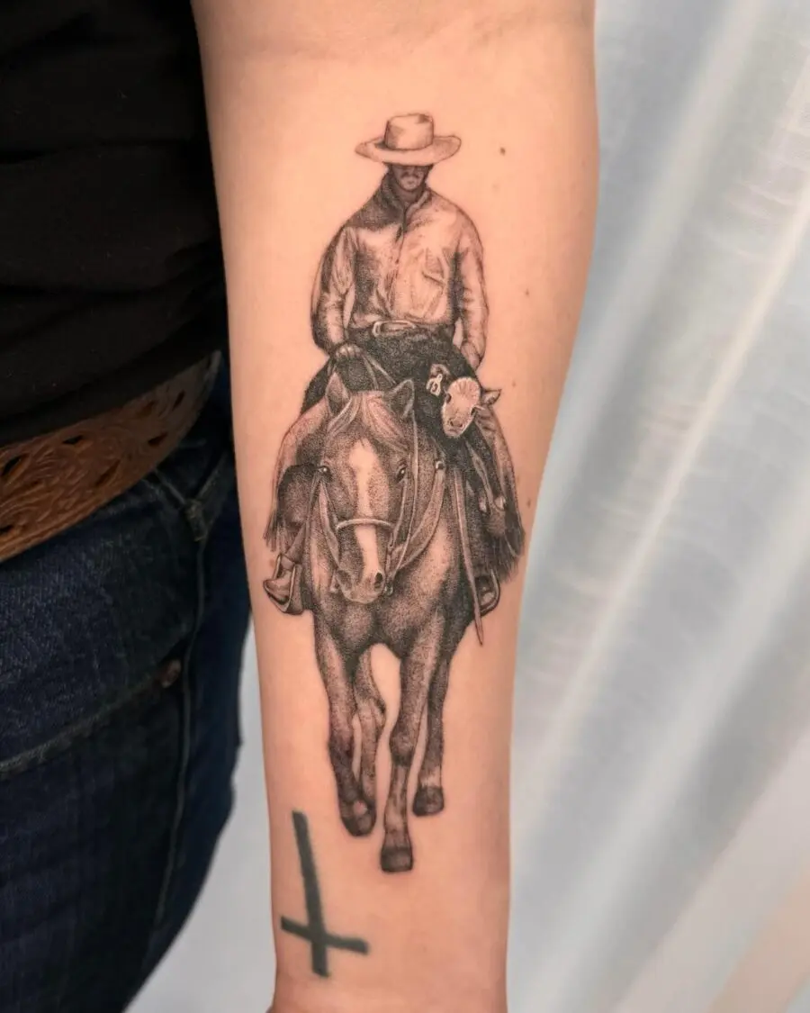 Stunning cowboy tattoo on a forearm