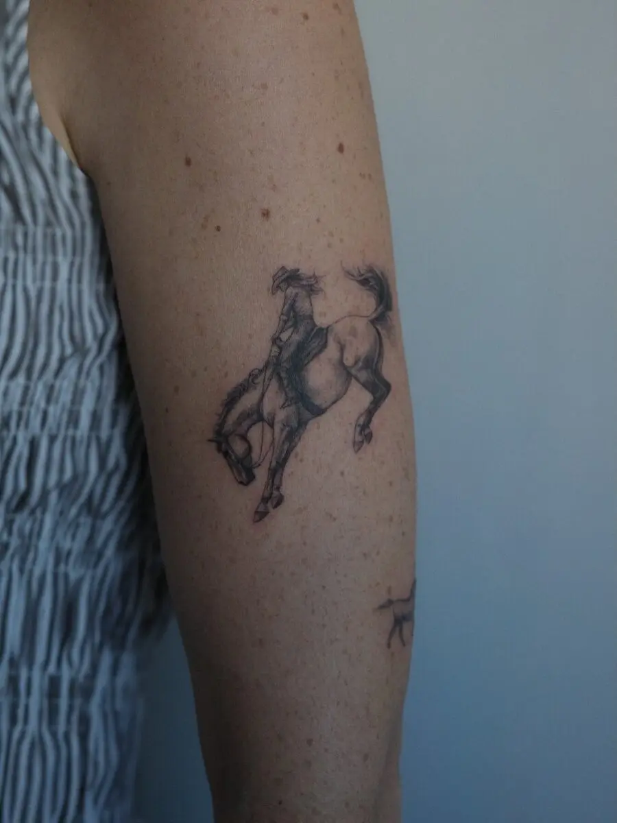 A captivating cowboy tattoo on display