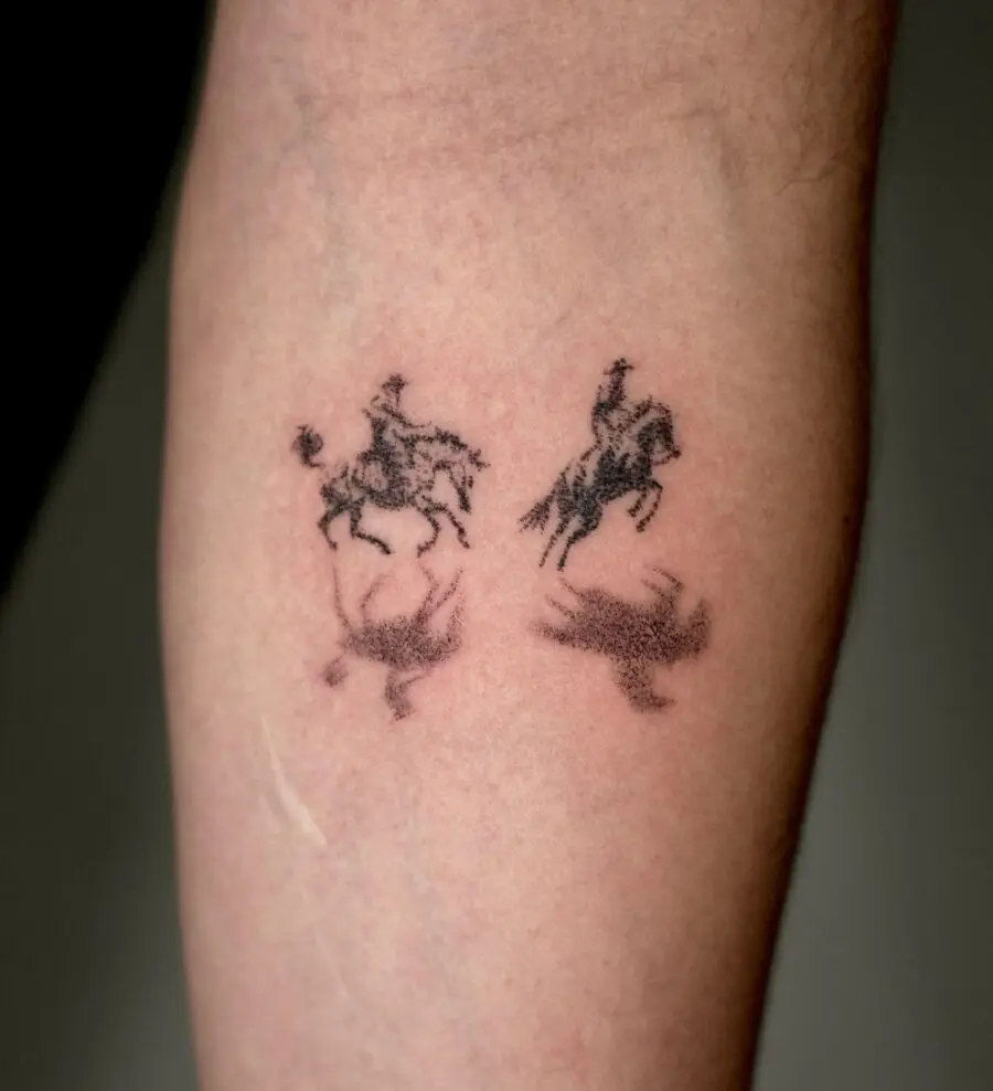 Dynamic horsemen silhouette western tattoo design