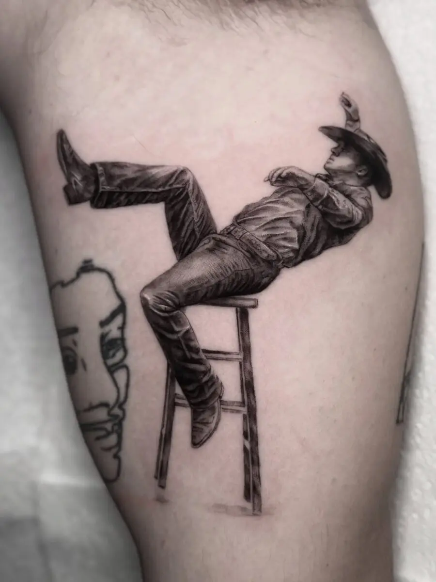 Stylized cowboy tattoo with dynamic pose