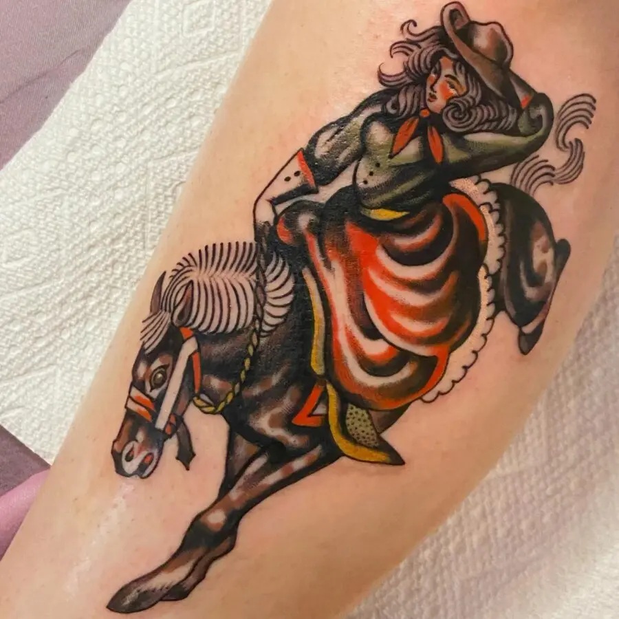 Dynamic tattoo showcasing western riding spirit