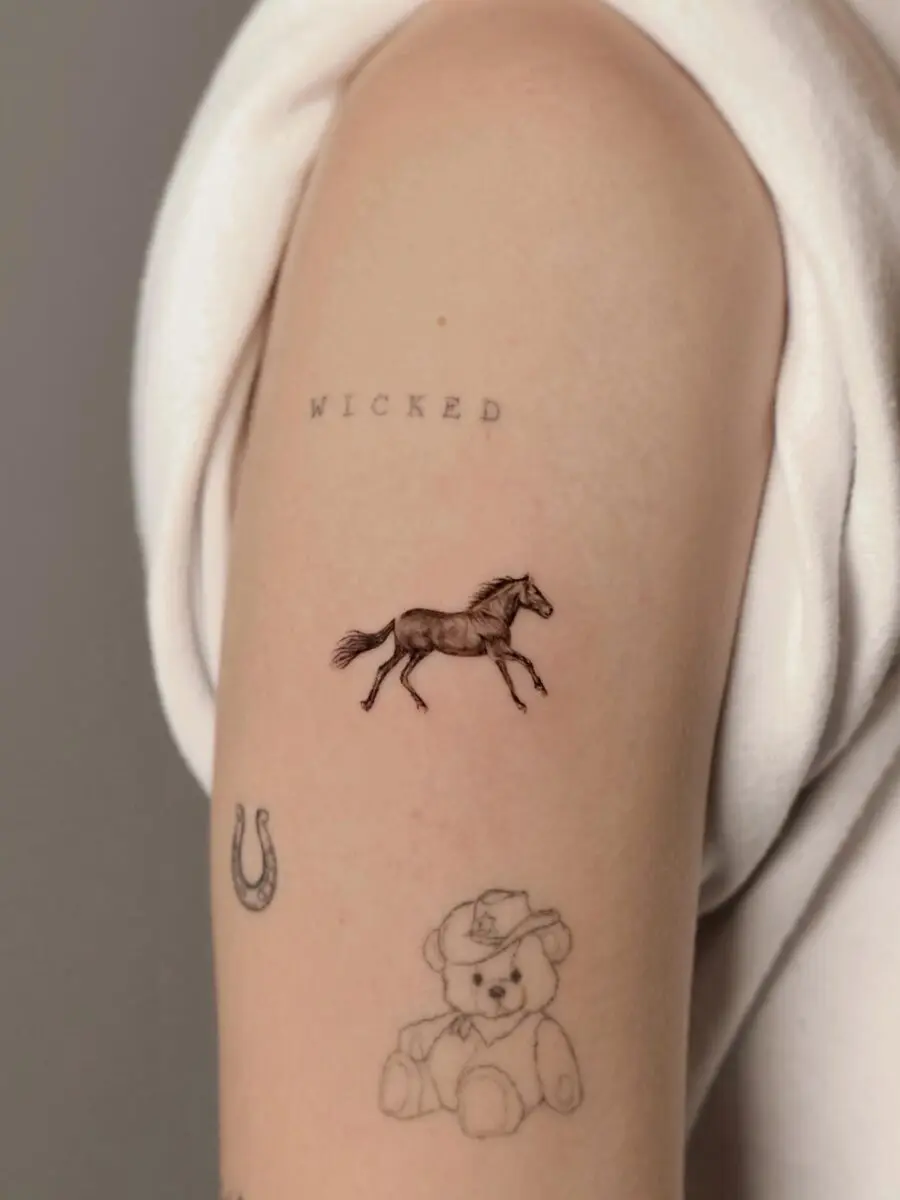 Elegant Horse Tattoo Symbolizing Freedom and Grace